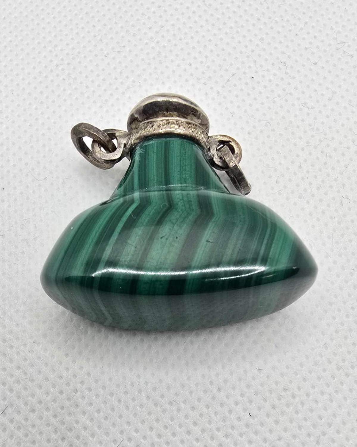 Banded malachite vessel, neck and stopper detail