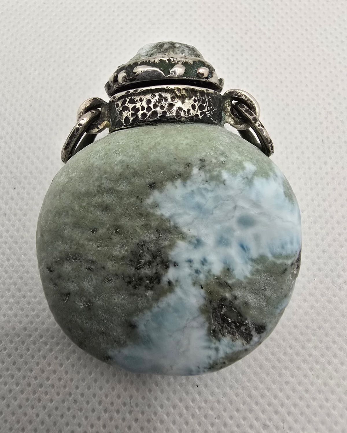 Larimar sphere vessel with silver collar and cap, front view