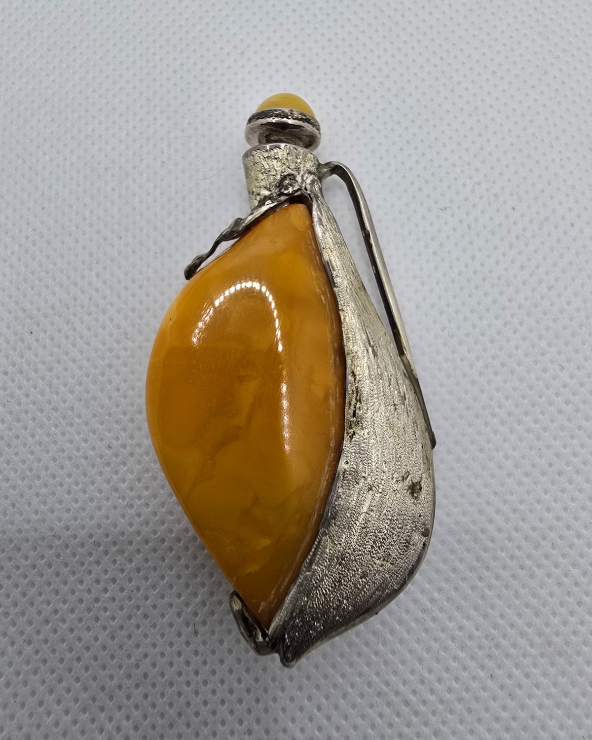 Baltic amber leaf flask with silver mount, reverse view
