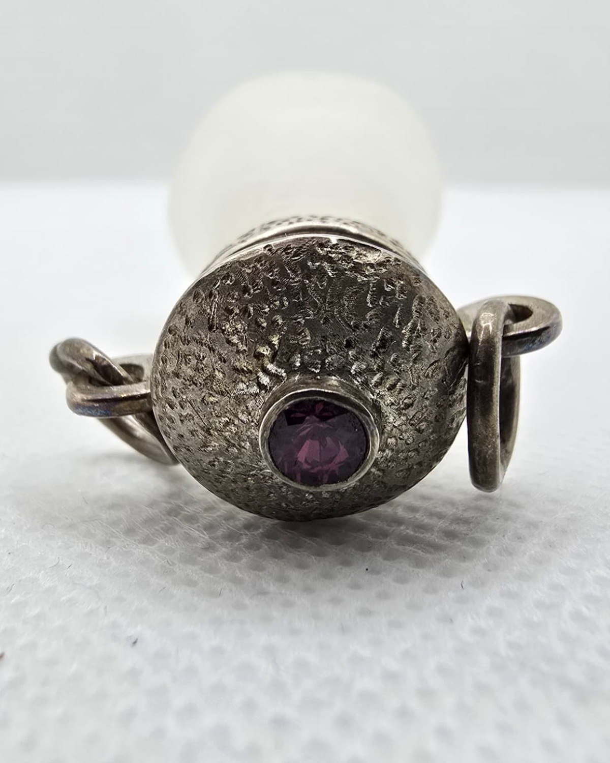 Frosted rock crystal flask, silver stopper set with an amethyst