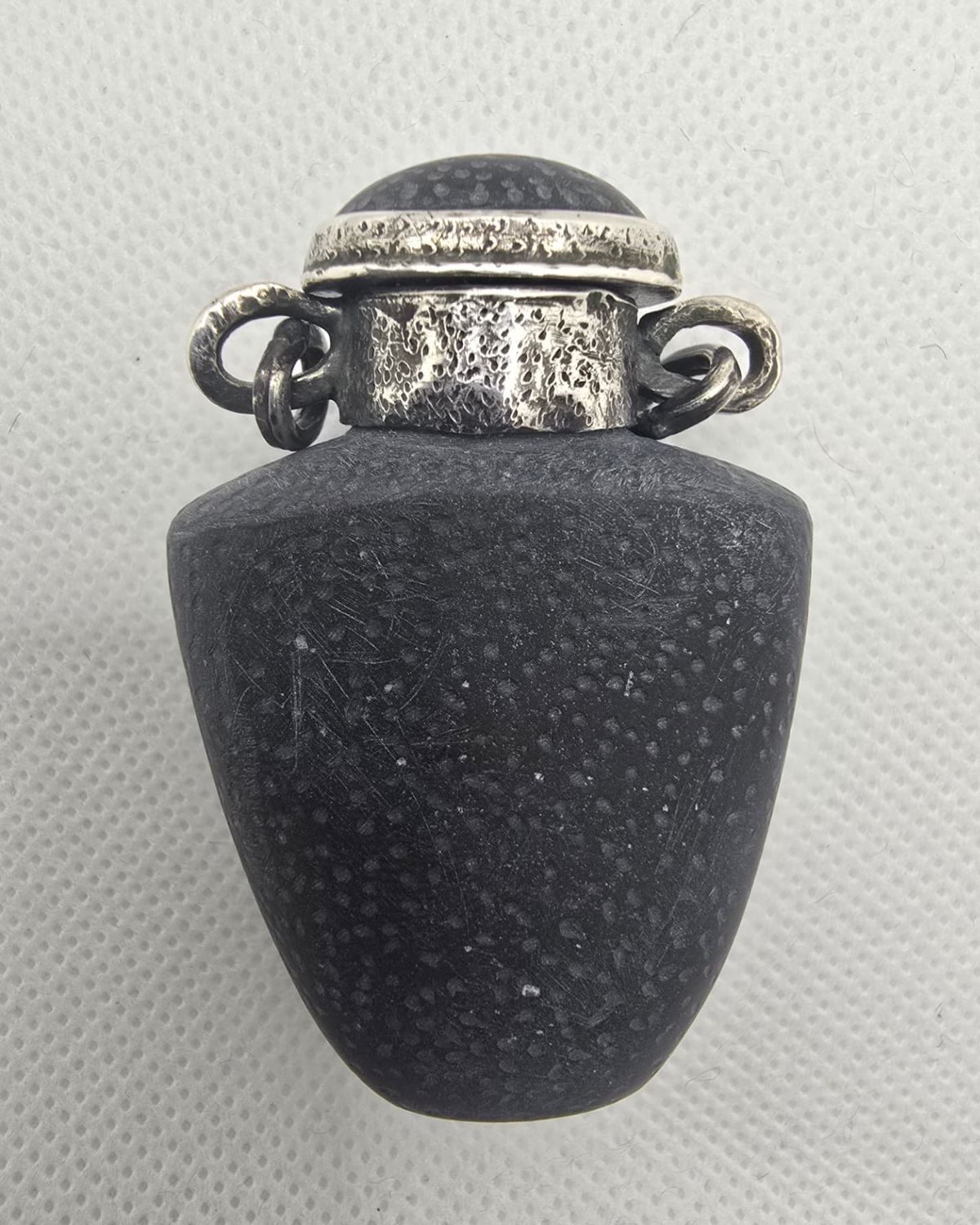 Black basalt vessel with silver mount, side view
