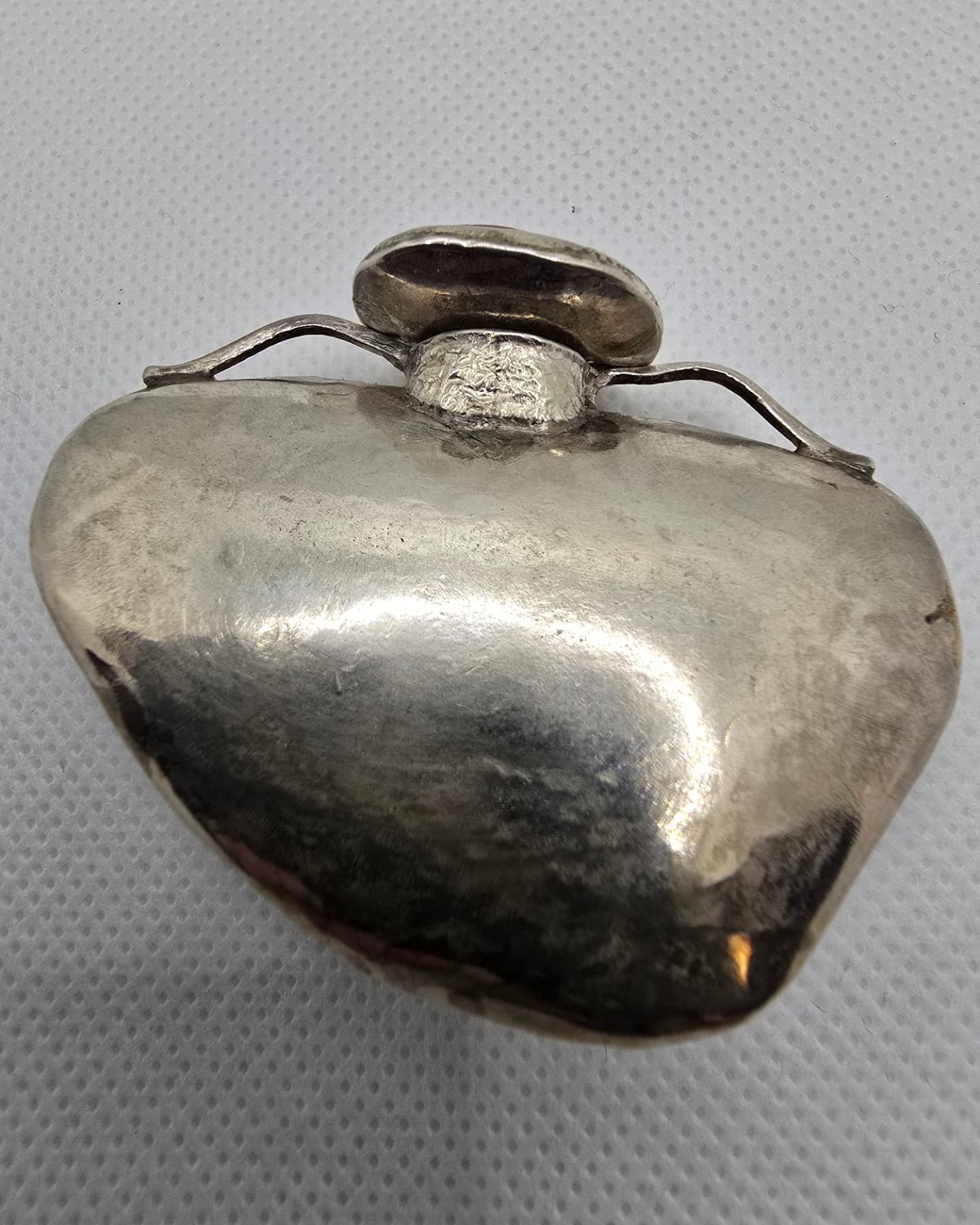 Abalone shell heart vessel, polished silver reverse with hand-formed stopper