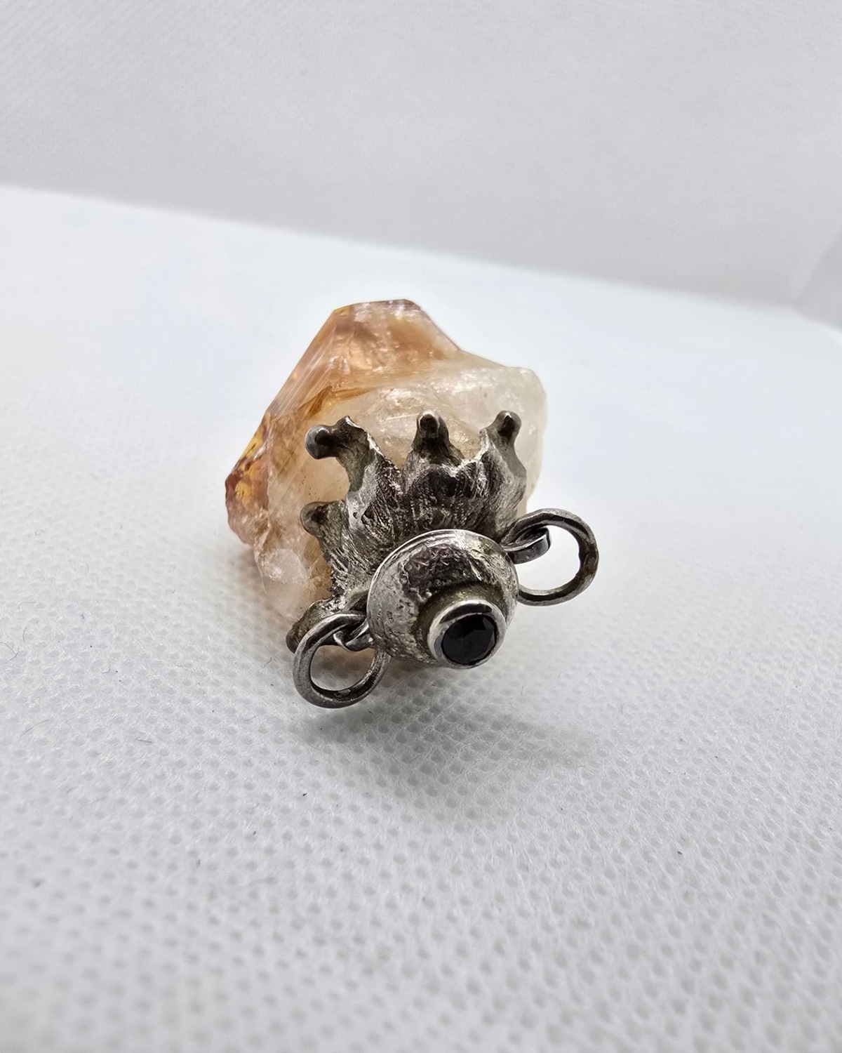 Citrine crystal vessel, silver crown collar and stopper detail