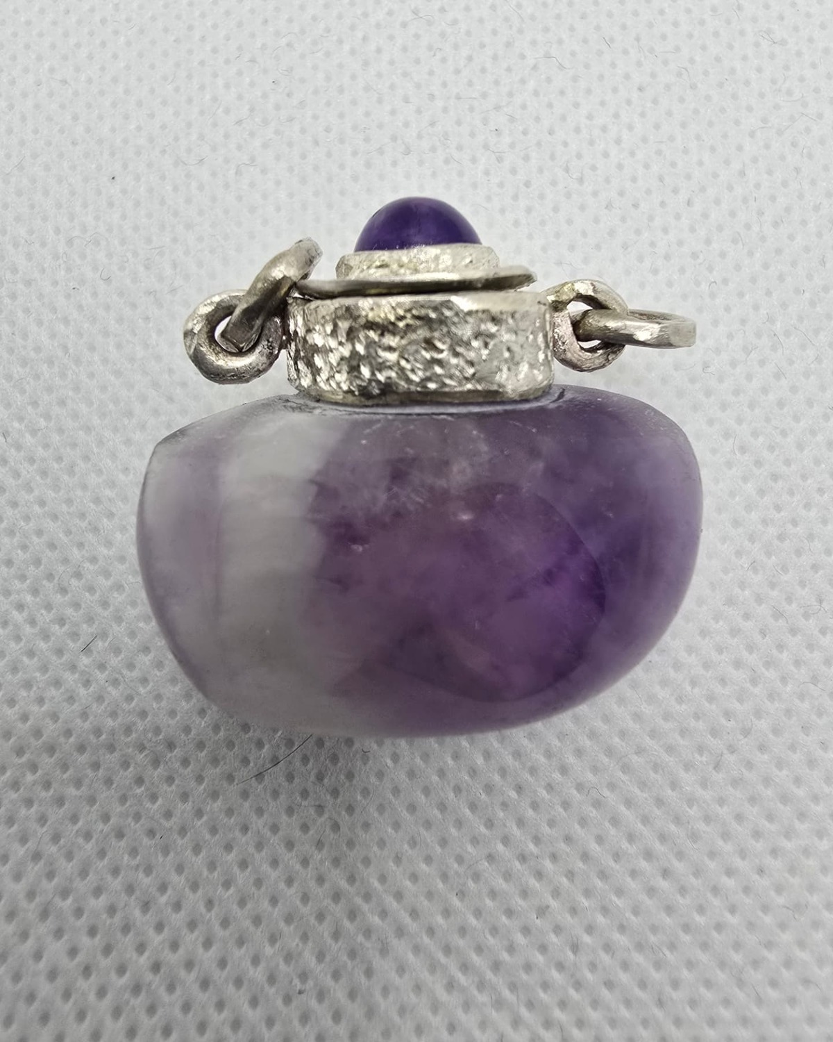 Amethyst vessel, neck and stopper detail