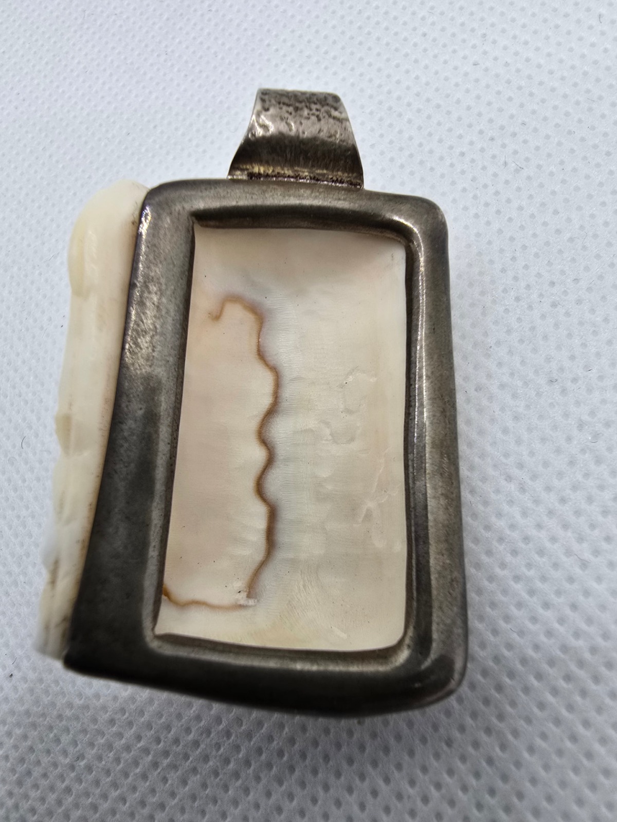 Angel in Prayer — reverse showing the natural shell and the substantial handmade silver framework and broad bail