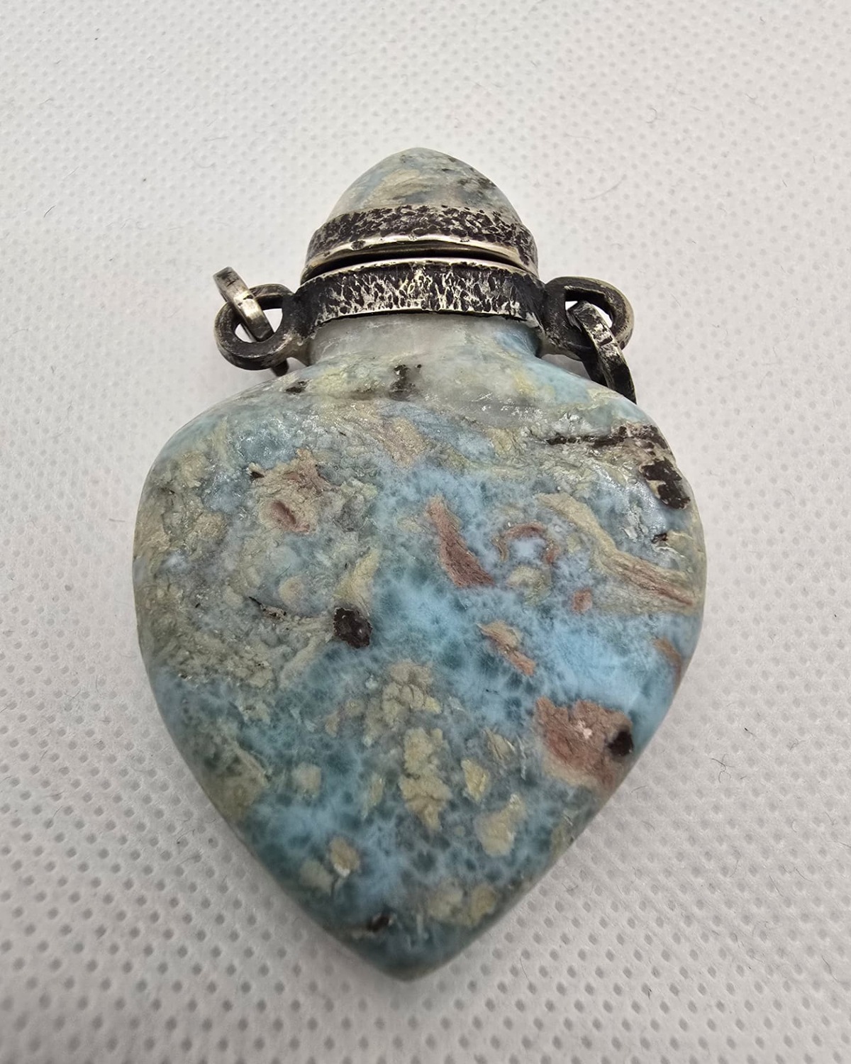 Blue K2 stone heart-form vessel, reverse view