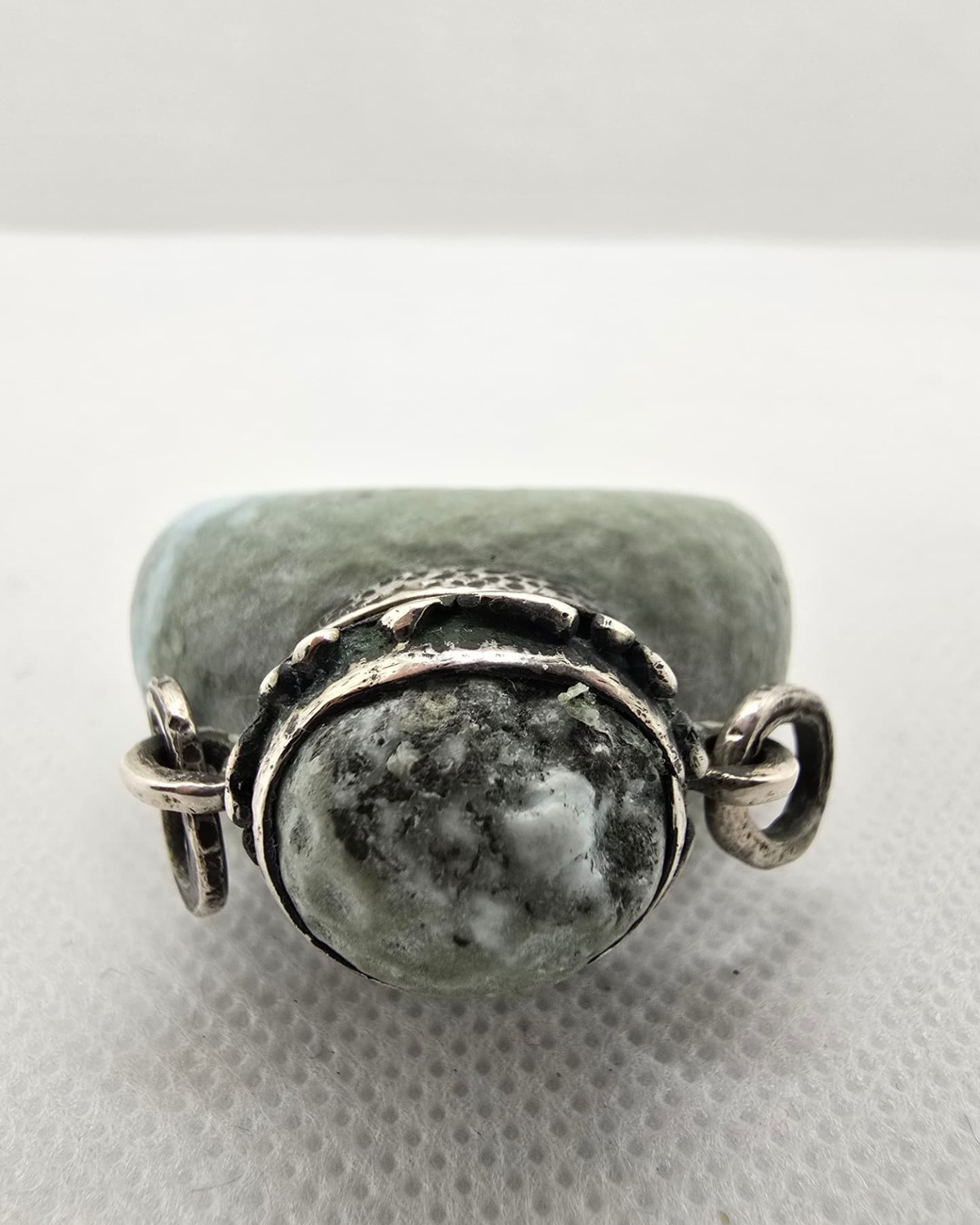 Larimar sphere vessel, top view showing silver cap
