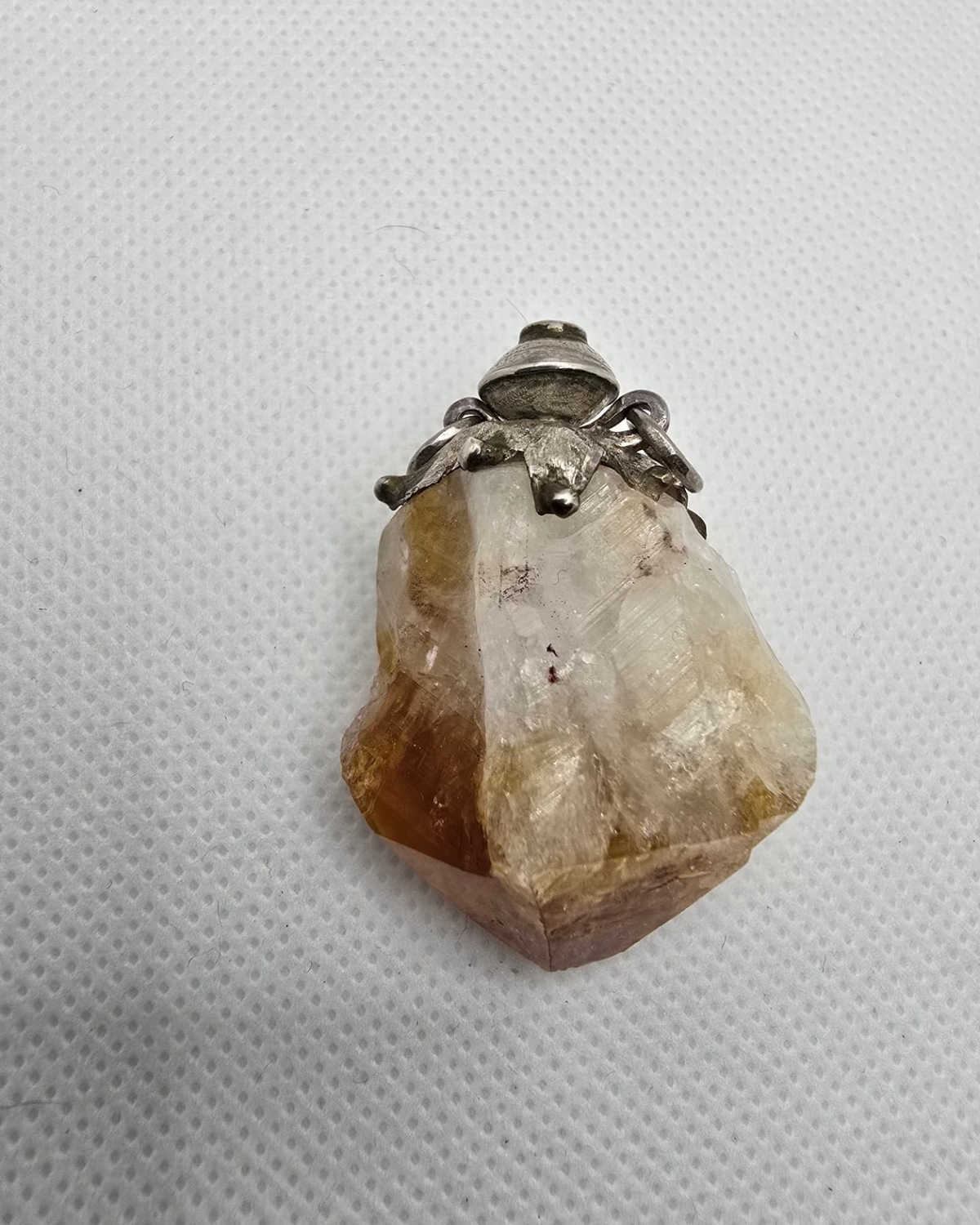 Citrine crystal vessel, reverse view showing golden inclusions
