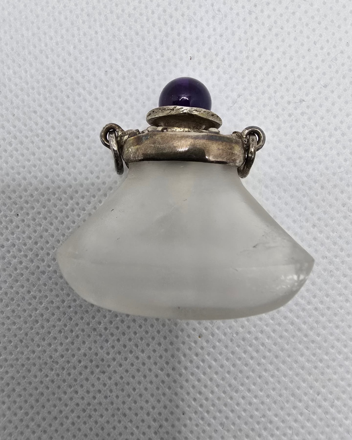 Frosted rock crystal flask, reverse view with silver collar and amethyst stopper
