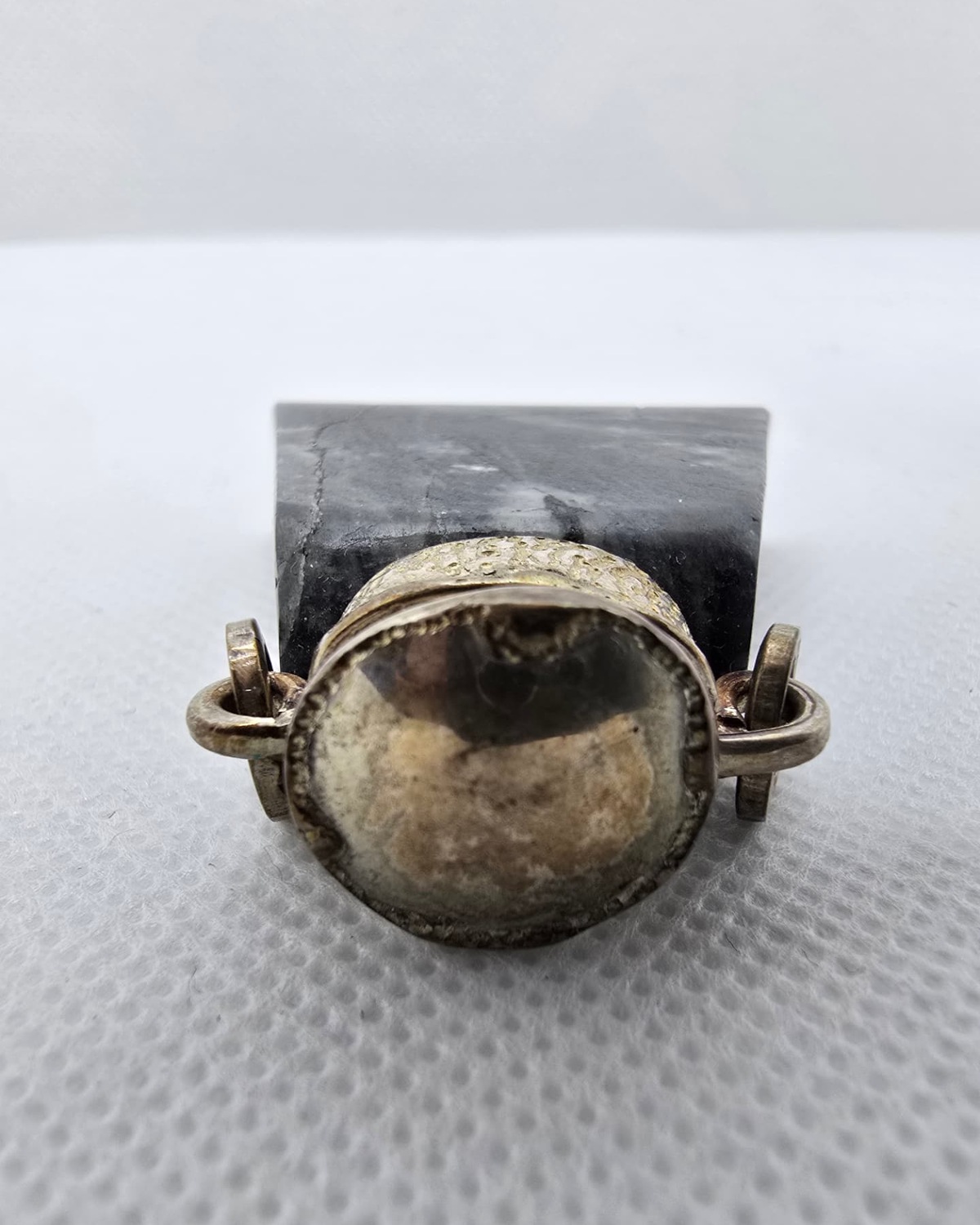 Sodalite trapezoid vessel seen from above, stopper detail