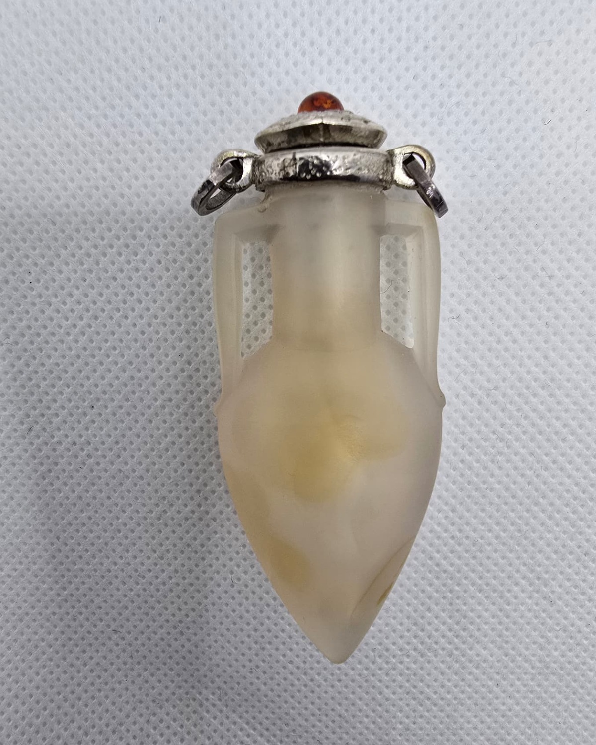 Frosted agate amphora with silver cap and amber cabochon, front view