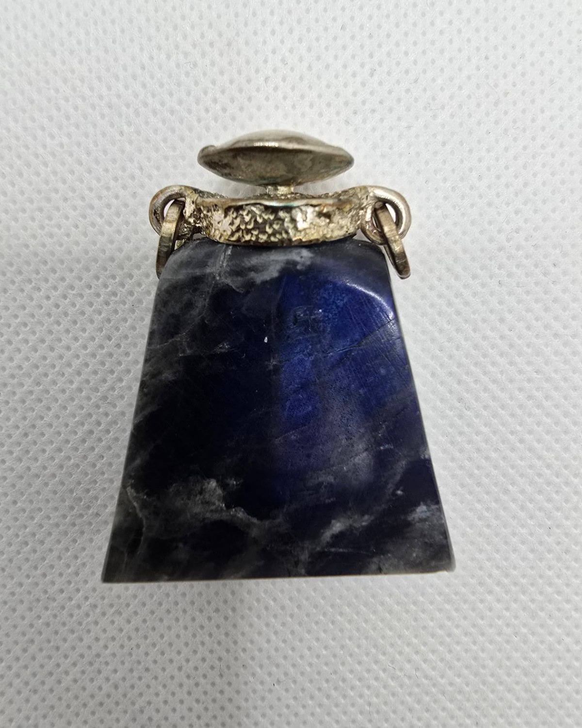 Sodalite trapezoid vessel, reverse view